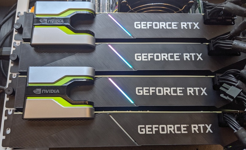 Four Asus GeForce RTX 2080 Ti blower-style video cards in two NVLink pairs