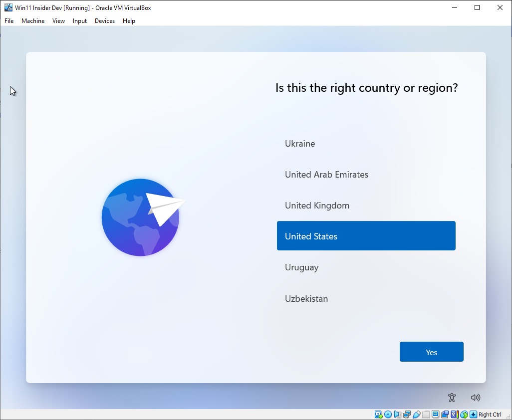 Windows 11 post-installation setup screen with country or region selection