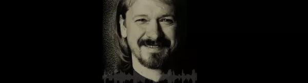 Robert Walker headshot on black background