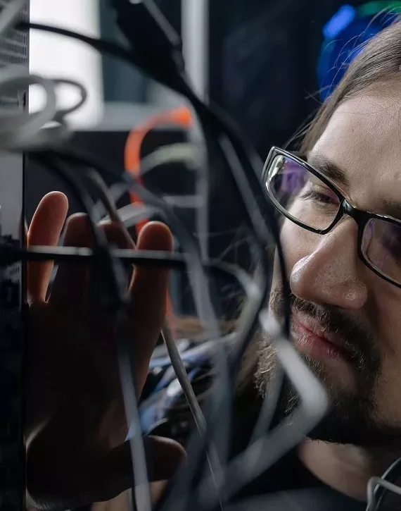 IT Worker with Computer Cabling